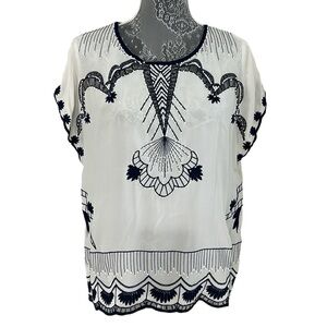 Nanette Lepore Size Large 100% silk beaded and embroidered blouse. New with tags